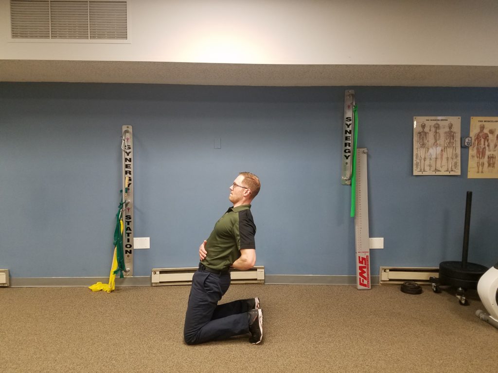 Kneeling Lean: Start in a tall-kneeling position. Engage your abs then lean back and hold for 2 breaths at least. Breath with your belly expanding. Make sure you keep a straight line from your knees to shoulders. Also, don't let your head stick out forward. Perform 2 sets, 10 reps, with 2 breath hold. 